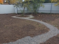 Благоустройство участка: монтаж садовых дорожек и отсыпка участка почво растительным грунтом в посёлке Лисий Нос